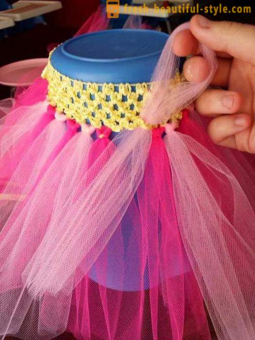 Tinkerbell kostume til piger med deres hænder